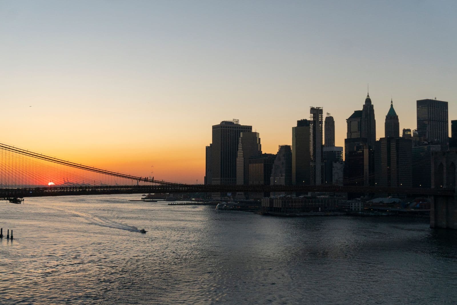 Brooklyn Bridge and skyline from the Brooklyn waterfront at sunset