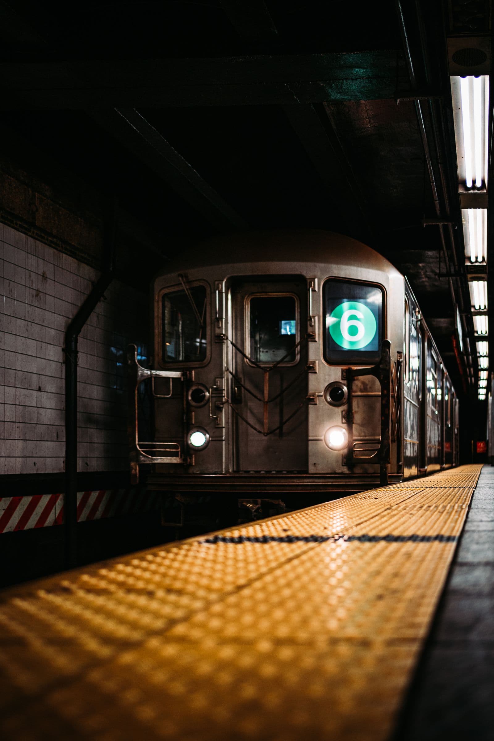 Subway train arriving at a platform